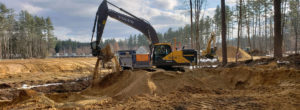 Photo of excavator digging at NH Veterans Cemetery Expansion Project in Boscawen, NH